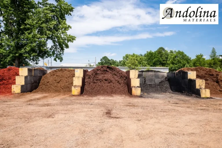 Landscape supply yard with mulch and soil material piles