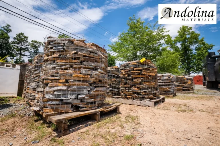 Bulk landscaping rocks stored in wire cages outdoors