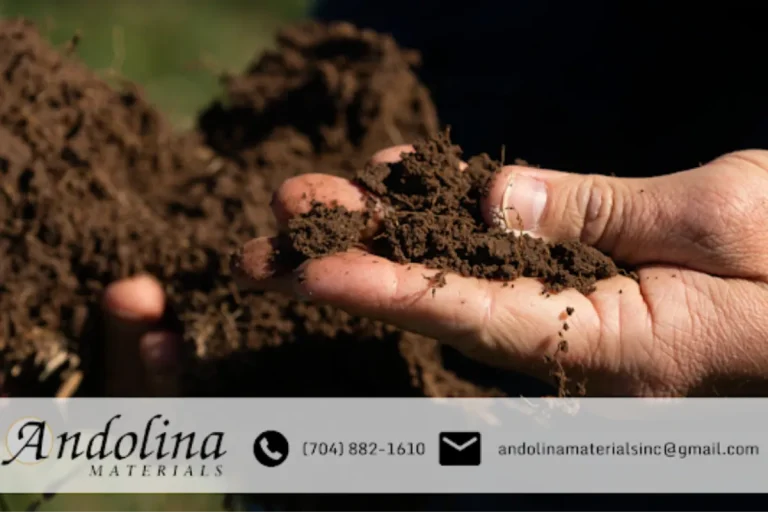 Close-up of topsoil being held for landscaping use.