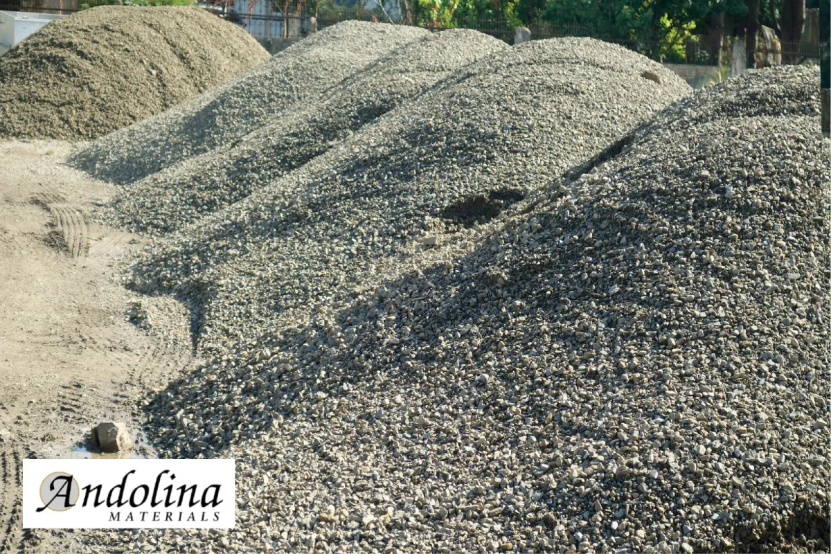 Gravel piles available from a Salisbury landscape supply yard.